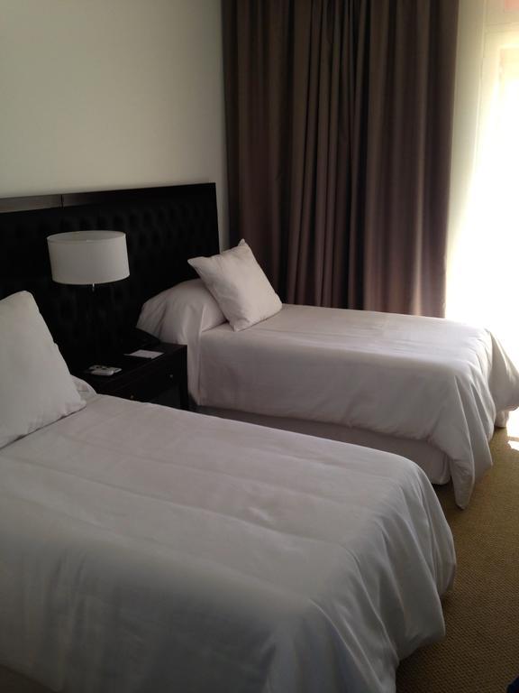Real Hotel Lujan Luaran gambar