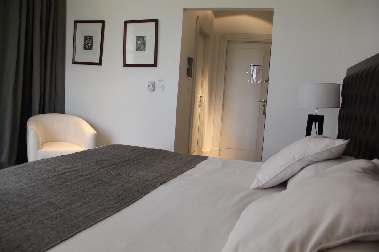Real Hotel Lujan Luaran gambar