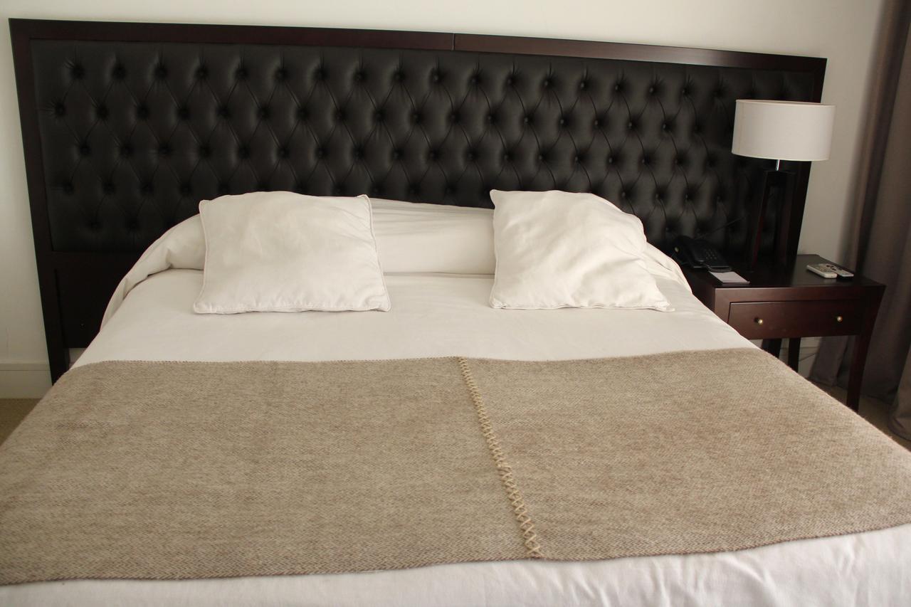 Real Hotel Lujan Luaran gambar