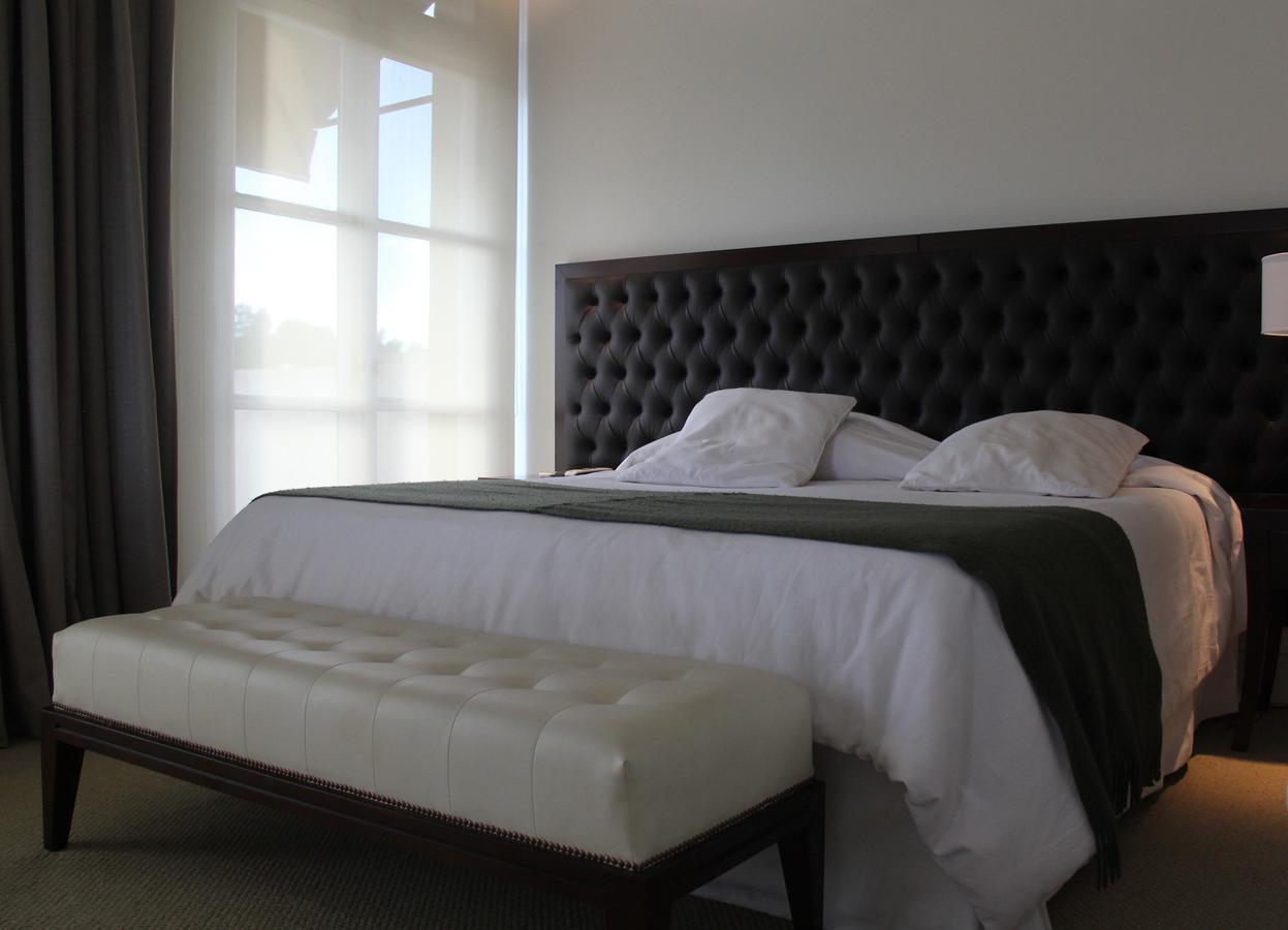 Real Hotel Lujan Luaran gambar